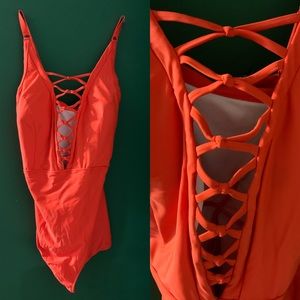 Orange One Piece with Cross Cross Center